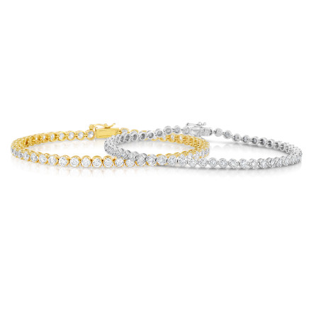 Tennis bracelets with round diamonds set in yellow and white gold
